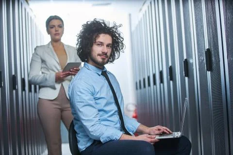 Two young technicans working Stock Photos