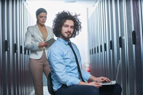Two young technicans working Stock Photos