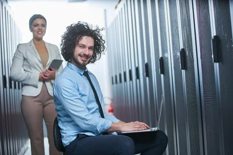 Two young technicans working Stock Photos