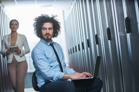Two young technicans working Stock Photos