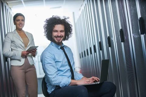 Two young technicans working Stock Photos