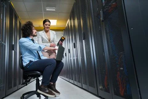 Two young technicans working Stock Photos