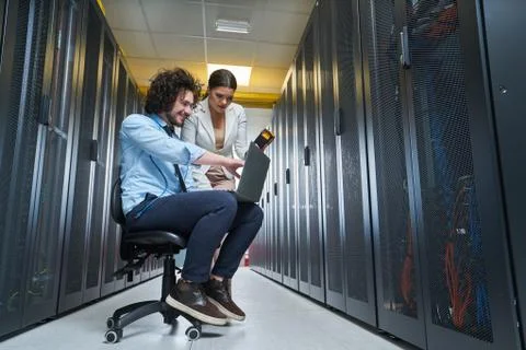 Two young technicans working Stock Photos