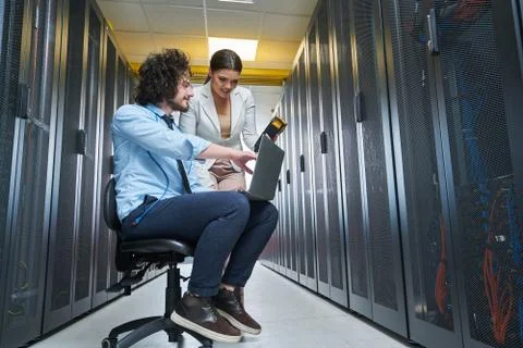 Two young technicans working Stock Photos