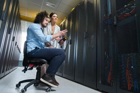 Two young technicans working Stock Photos
