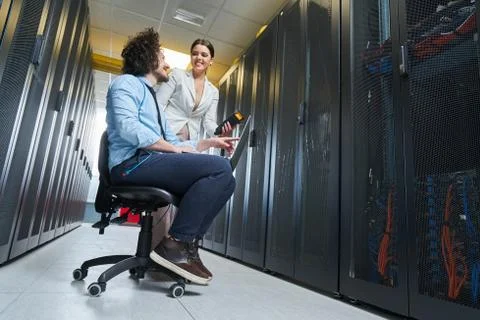 Two young technicans working Stock Photos