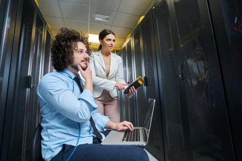 Two young technicans working Stock Photos