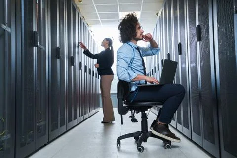 Two young technicans working Stock Photos