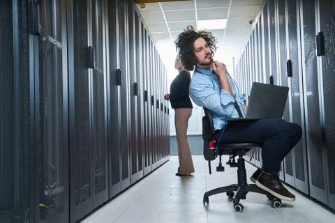 Two young technicans working Stock Photos