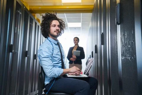 Two young technicans working Stock Photos