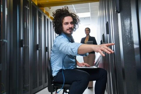 Two young technicans working Stock Photos