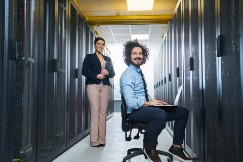 Two young technicans working Stock Photos