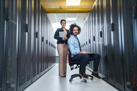 Two young technicans working Stock Photos