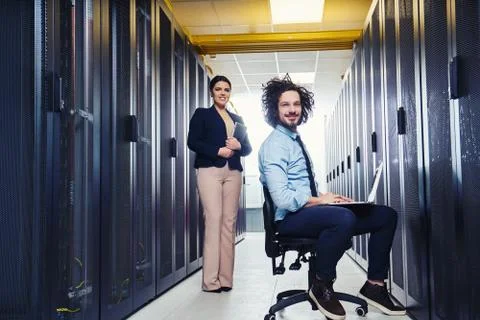 Two young technicans working Stock Photos