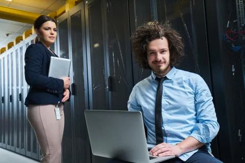 Two young technicans working Stock Photos