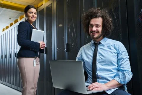 Two young technicans working Stock Photos