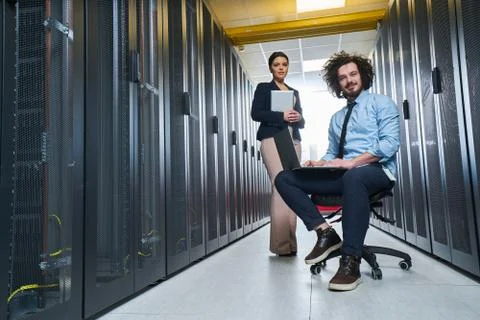 Two young technicans working Stock Photos