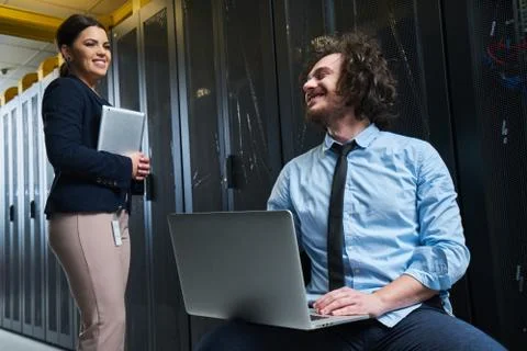 Two young technicans working Stock Photos