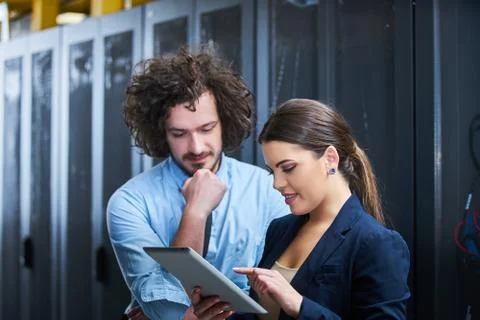Two young technicans working Stock Photos