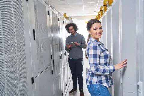 Two young technicans working Stock Photos