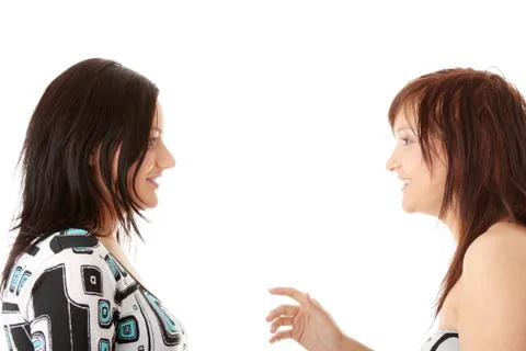 Two young womans talking Stock Photos