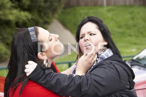 Two Young Women Fighting Stock Photos