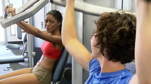 Two young women friends working out at gym Stock-Footage 934053
