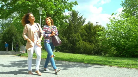 Two young women walking Stock Footage 64539726