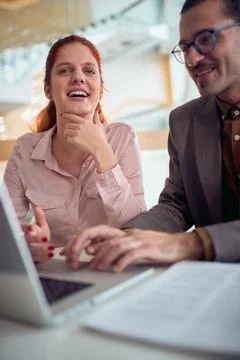 Two young work colleagues having a break together Stock Photos