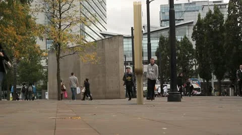 Two youths run past camera Stock Footage 10688901