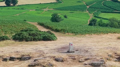 Twyn y Gaer Trig Point on Mynydd Illtyd in Summer, Drone Pan Stock Footage 341774305