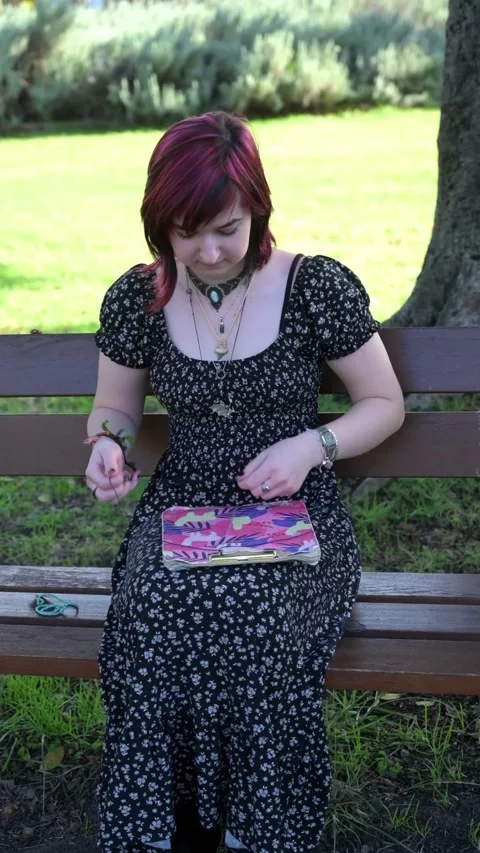 Tying beads on threat Stock Footage 295607715