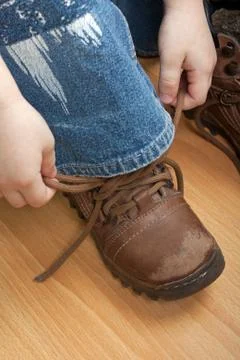 Tying lace Stock Photos