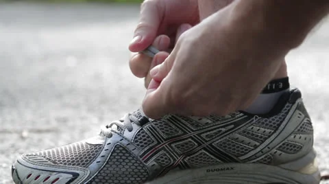 Tying Shoe Stock Footage 27125044