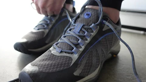 Tying Shoe laces 02 Stock Footage 146713089
