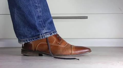 Tying Shoe laces Stock Footage 12592506
