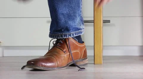 Tying Shoe laces Stock Footage 12592512