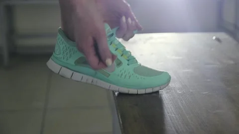 Tying shoelaces Stock Footage 133716298