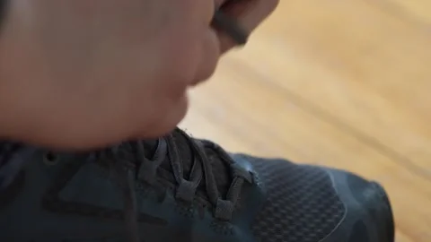 Tying shoelaces Stock Footage 322191024
