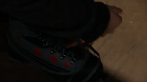 Tying shoelaces on ice skates Stock Footage 82489194
