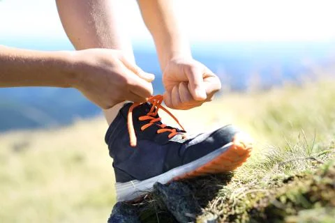 Tying shoelaces. Stock Photos