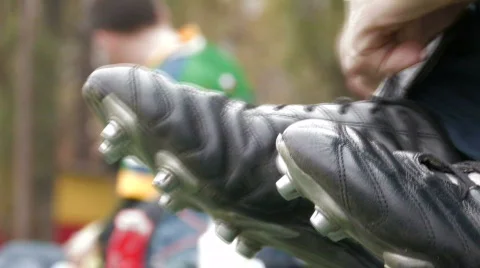 Tying up shoes  Stock Footage 308189