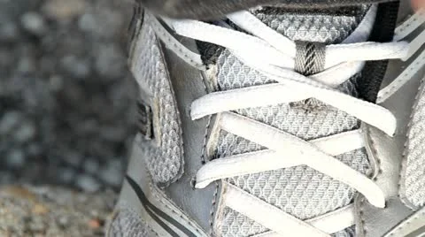 Tying Shoestrings 動画素材 12580761