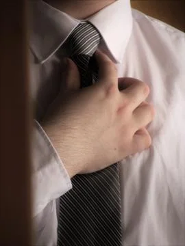 Tying a tie Foto stock