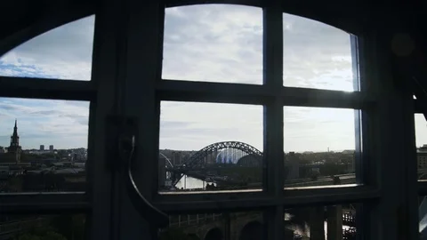 Tyne Bridge through oval window frame Stock Footage 81136019