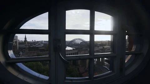 Tyne Bridge through oval window frame wide Stock Footage 81136115