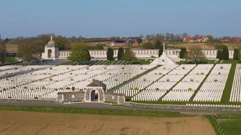 Tyne cot war cemetery aerial view pristine white wwi headstones cross of Stock Footage 341740422