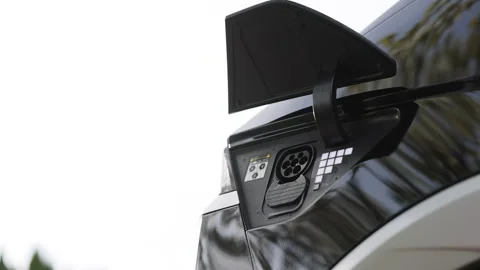 Type 2 CCS Combo plug port on electric vehicle. Fast charging socket type 2 Vídeos de archivo 271629083