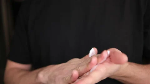 Type of application of moisturizer on the hands. Hand care, skin care, home beau Stock Footage 146828808