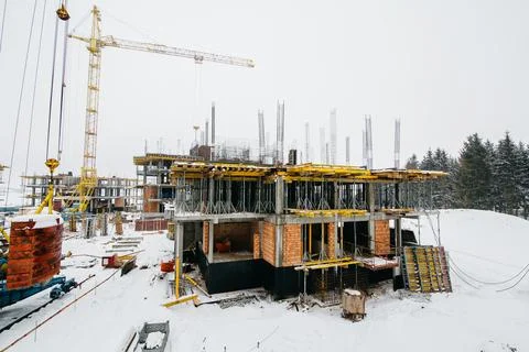 Type of complex engineering construction of houses in winter time Stock Photos